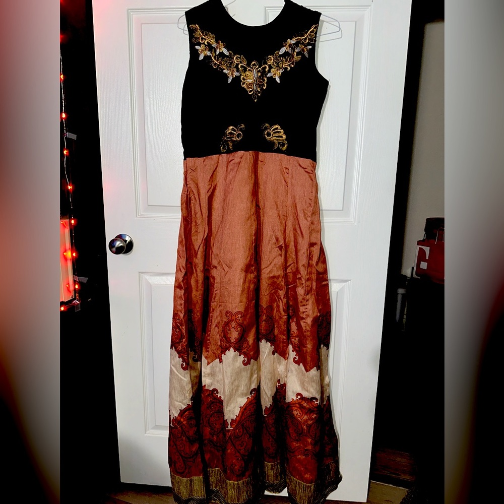 I have a handmade, long, beautiful Indian dress like new, worn one time